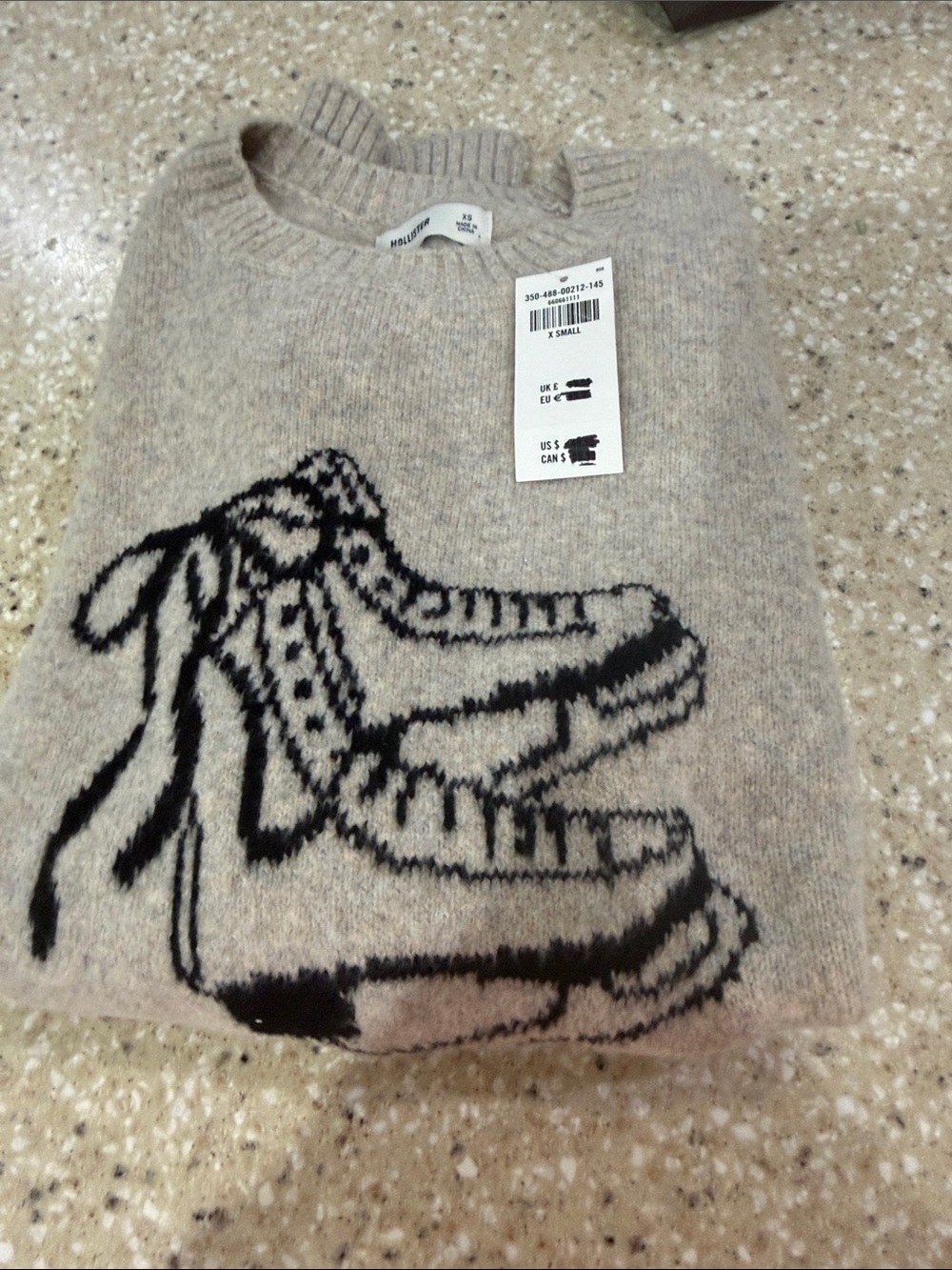Hollister Beige Crewneck Sweater with Black Skate Shoe Graphic